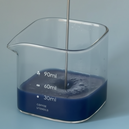 Dissolve the The Song Cha Butterfly Pea Powder with Hot water