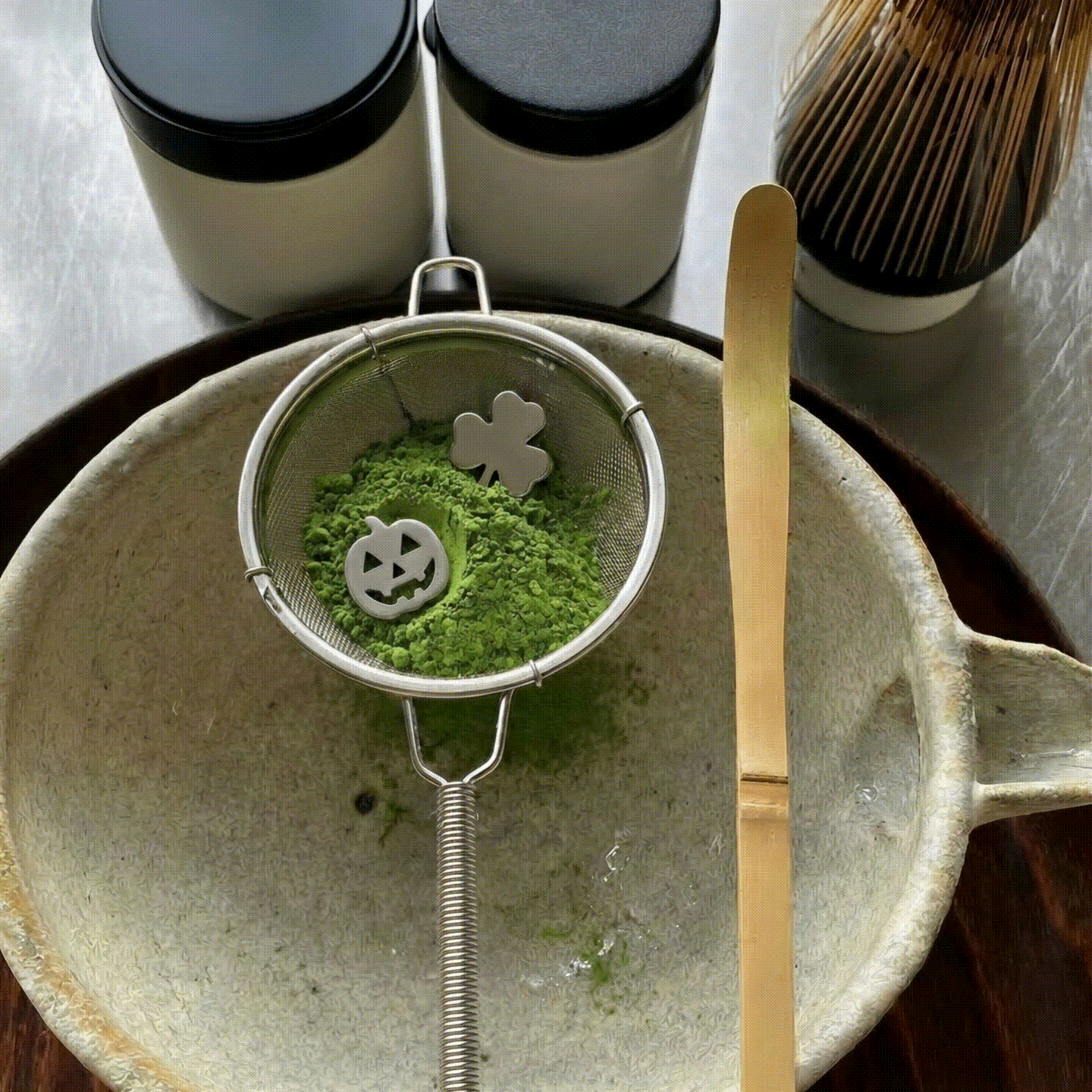 The Song Cha stainless steel tea sifter weight used for sifting matcha tea powder